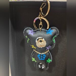 Black Bear Keychain with Colorful Star Accents